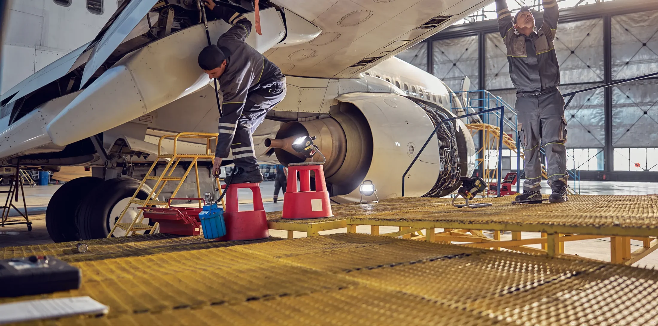 Man performing maintanence on his aircraft